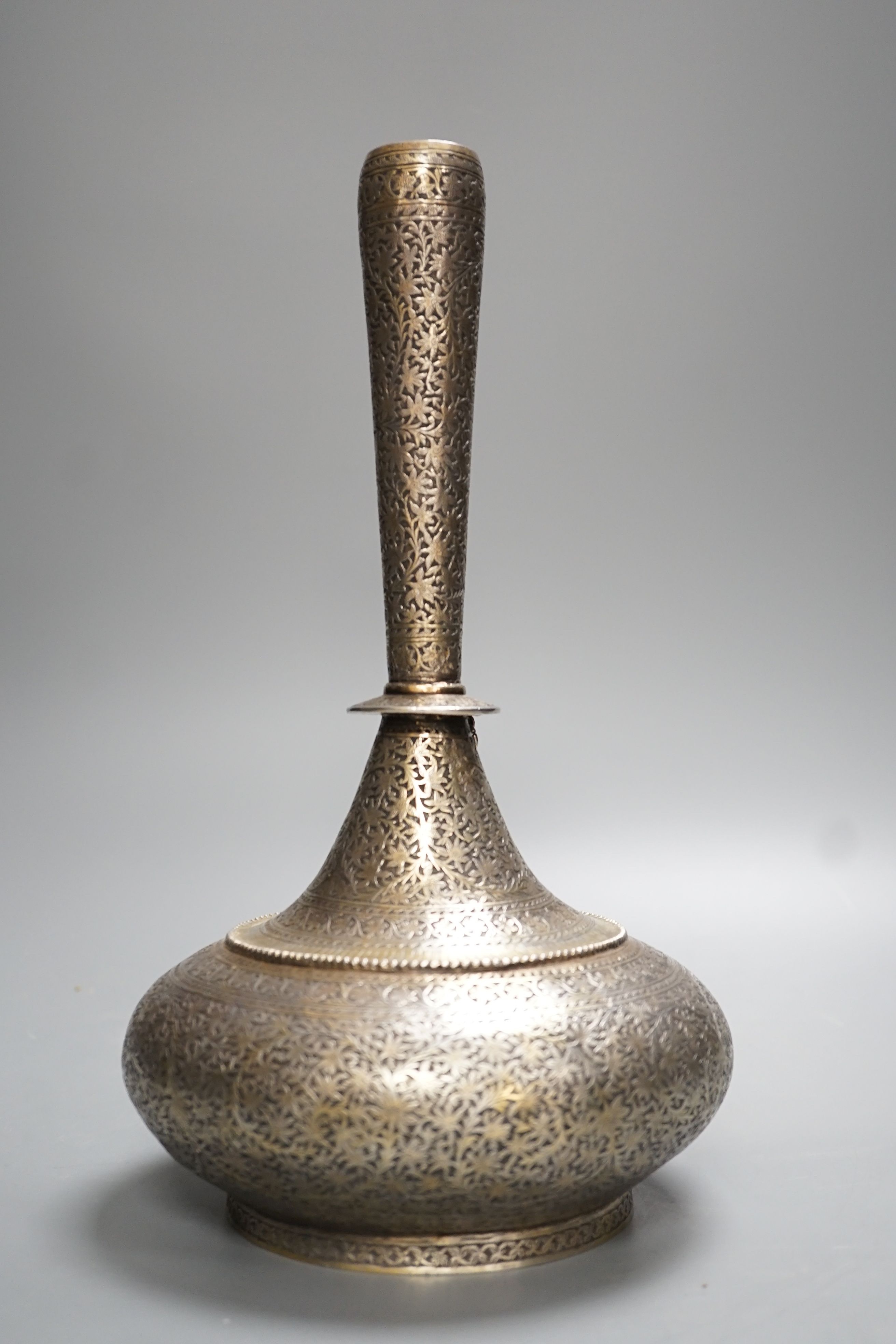 A 19th century North Indian silver surahi with engraved shawl decoration 30cm